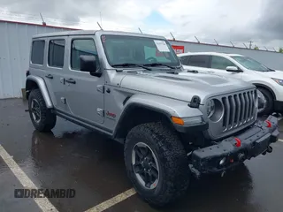 2018 Jeep Wrangler Unlimited Rubicon z VIN 1C4HJXFG7JW113925, wystawiony jako IAAI lot #42555746 z przebiegiem 63 165 mil mil oraz . Historia ofert i sprzedaży dostępna na DreamBid. Obrazek 1.