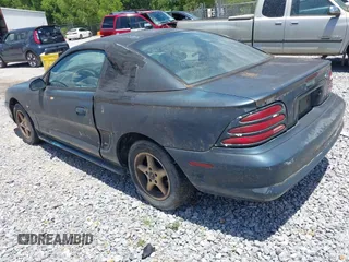 1995 Ford Mustang z VIN 1FALP4043SF254164, wystawiony jako IAAI lot #42790691 z przebiegiem 86 581 mil mil oraz . Historia ofert i sprzedaży dostępna na DreamBid. Obrazek 3.