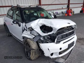 2015 MINI Countryman S z VIN WMWZC5C56FWP45194, wystawiony jako IAAI lot #40300703 z przebiegiem 95 760 mil mil oraz . Historia ofert i sprzedaży dostępna na DreamBid. Obrazek 6.