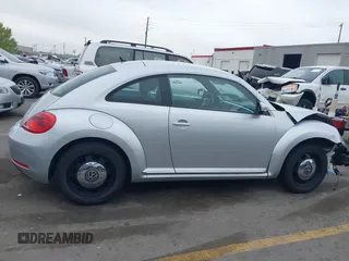 2013 Volkswagen Beetle with VIN 3VWHX7ATXDM658134, listed as a IAAI auction lot 42097779 with 47,901 mi miles and . Bid and sale history available at DreamBid. Image 14.