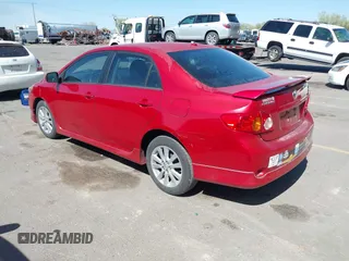 2009 Toyota Corolla with VIN 1NXBU40E09Z098951, listed as a IAAI auction lot 42090512 with 199,787 mi miles. Bid and sale history available at carsss.com. Image 3.