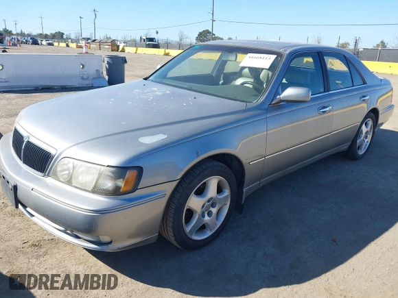 1999 Infiniti Q45 z VIN JNKBY31A8XM603290, wystawiony jako IAAI lot #41668113 z przebiegiem 144 251 mil mil oraz . Historia ofert i sprzedaży dostępna na DreamBid. Obrazek 2.