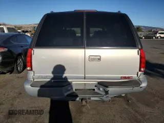 2000 GMC Denali z VIN 1GKEK63R8YR212220, wystawiony jako Copart lot #77606364 z przebiegiem 337 467 mil mil oraz Tytuł czysty. Historia ofert i sprzedaży dostępna na DreamBid. Obrazek 6.