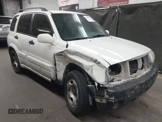 2002 Suzuki Grand Vitara JLX z VIN JS3TD62V824156720, wystawiony jako IAAI lot #42058409 z przebiegiem Nie podano mil oraz . Historia ofert i sprzedaży dostępna na DreamBid. Obrazek 1.
