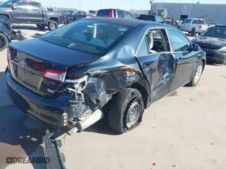2013 Toyota Camry Hybrid LE with VIN 4T1BD1FK6DU070138, listed as a IAAI auction lot 41668658 with 148,065 mi miles. Bid and sale history available at carsss.com. Image 4.