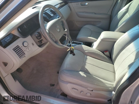 2010 Cadillac DTS w/1SC with VIN 1G6KD5EYXAU126775, listed as a Copart auction lot 77207094 with 100,288 mi miles and Salvage Title. Bid and sale history available at carsss.com. Image 7.