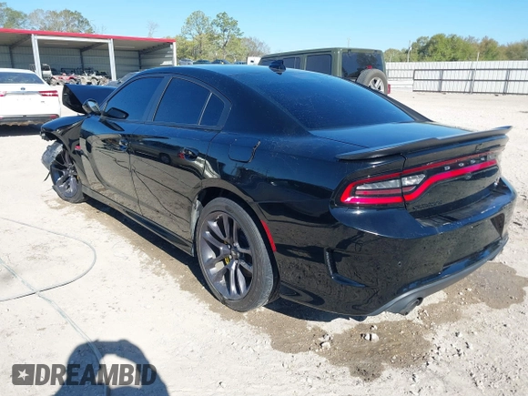 2022 Dodge Charger Scat Pack with VIN 2C3CDXGJ7NH125951, listed as a IAAI auction lot 41811902 with 24,399 mi miles and . Bid and sale history available at carsss.com. Image 3.
