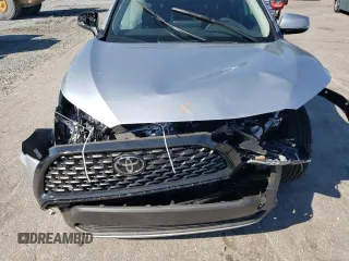 2024 Toyota Corolla Cross LE z VIN 7MUCAAAG5RV098535, wystawiony jako Copart lot #52483595 z przebiegiem Nie podano mil oraz Szkoda całkowita • Salvage title. Historia ofert i sprzedaży dostępna na DreamBid. Obrazek 12.