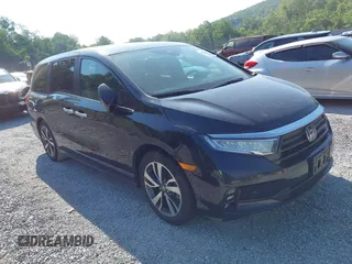 2021 Honda Odyssey Touring with VIN 5FNRL6H84MB027396, listed as a IAAI auction lot 42616650 with 67,207 mi miles and . Bid and sale history available at DreamBid. Image 1.