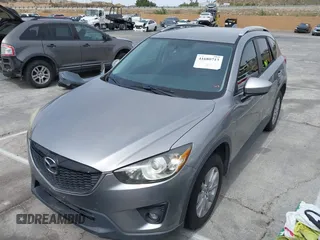 2014 Mazda CX-5 Touring with VIN JM3KE2CY3E0429025, listed as a IAAI auction lot 41680713 with 113,065 mi miles. Bid and sale history available at carsss.com. Image 6.