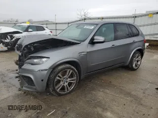 2012 BMW X5 M with VIN 5YMGY0C54CLK27815, listed as a Copart auction lot 83010304 with 0 mi miles and Salvage Title. Bid and sale history available at carsss.com. Image 1.