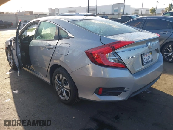 2018 Honda Civic LX with VIN 2HGFC2F58JH571072, listed as a IAAI auction lot 41684450 with 66,032 mi miles and . Bid and sale history available at carsss.com. Image 3.