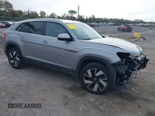 2024 Volkswagen Atlas SE z VIN 1V2WE2CA3RC202868, wystawiony jako IAAI lot #41160552 z przebiegiem 14 868 mil mil oraz . Historia ofert i sprzedaży dostępna na DreamBid. Obrazek 1.