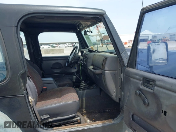 1999 Jeep Wrangler Sport z VIN 1J4FY19S0XP471848, wystawiony jako IAAI lot #42264563 z przebiegiem 280 121 mil mil oraz . Historia ofert i sprzedaży dostępna na DreamBid. Obrazek 5.
