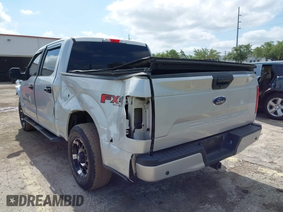 2019 Ford F-150 XL with VIN 1FTEW1E55KKC58276, listed as a IAAI auction lot 42133235 with 97,032 mi miles. Bid and sale history available at carsss.com. Image 3.