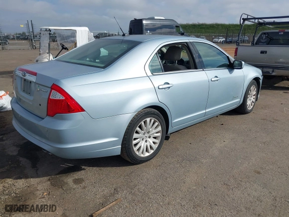 2011 Ford Fusion Hybrid with VIN 3FADP0L3XBR299914, listed as a IAAI auction lot 41659161 with 169,448 mi miles. Bid and sale history available at carsss.com. Image 4.