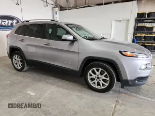 2017 Jeep Cherokee Latitude with VIN 1C4PJLCB3HD232882, listed as a Copart auction lot 63185575 with 126,000 mi miles and Salvage title. Bid and sale history available at DreamBid. Image 4.