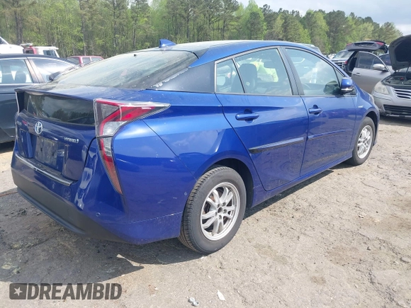 2018 Toyota Prius Two with VIN JTDKARFU4J3056091, listed as a IAAI auction lot 41919790 with 85,025 mi miles. Bid and sale history available at carsss.com. Image 4.