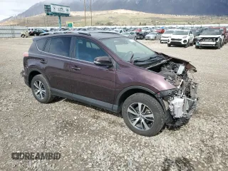 2018 Toyota RAV4 XLE with VIN 2T3RFREV3JW778241, listed as a Copart auction lot 51157395 with 74,317 mi miles and Salvage Title. Bid and sale history available at carsss.com. Image 4.