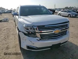 2017 Chevrolet Suburban Premier with VIN 1GNSCJKCXHR348044, listed as a Copart auction lot 55957535 with 112,131 mi miles and Salvage title. Bid and sale history available at DreamBid. Image 14.