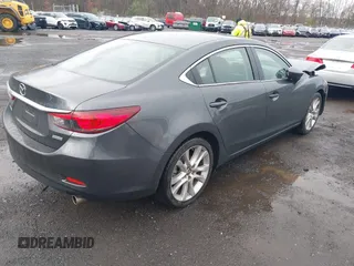 2014 Mazda Mazda6 i Touring with VIN JM1GJ1V6XE1138483, listed as a IAAI auction lot 41956426 with 91,294 mi miles. Bid and sale history available at carsss.com. Image 4.