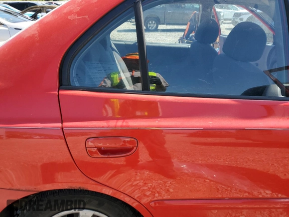 2005 Hyundai Accent GLS with VIN KMHCG45C15U592443, listed as a Copart auction lot 52291025 with 142,263 mi miles and Salvage Title. Bid and sale history available at carsss.com. Image 10.