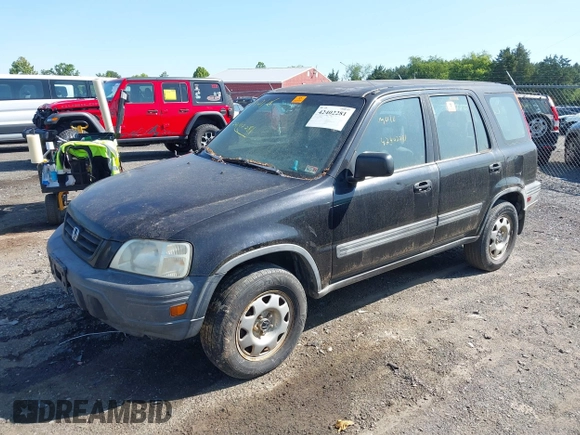 1999 Honda CR-V LX z VIN JHLRD2842XC010409, wystawiony jako IAAI lot #42402281 z przebiegiem 265 901 mil mil oraz . Historia ofert i sprzedaży dostępna na DreamBid. Obrazek 2.