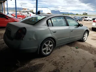 2002 Nissan Altima SE with VIN 1N4BL11D22C205463, listed as a Copart auction lot 68267834 with 210,983 mi miles and Clean Title. Bid and sale history available at carsss.com. Image 3.