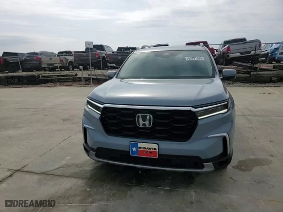 2025 Honda Pilot Touring with VIN 5FNYG2H78SB000571, listed as a Copart auction lot 45391595 with 6,916 mi miles and Salvage Title. Bid and sale history available at carsss.com. Image 12.