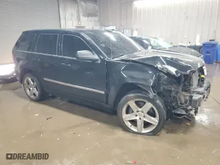 2007 Jeep Grand Cherokee SRT-8 with VIN 1J8HR78377C512937, listed as a Copart auction lot 83219784 with 158,485 mi miles and Salvage Title. Bid and sale history available at carsss.com. Image 4.