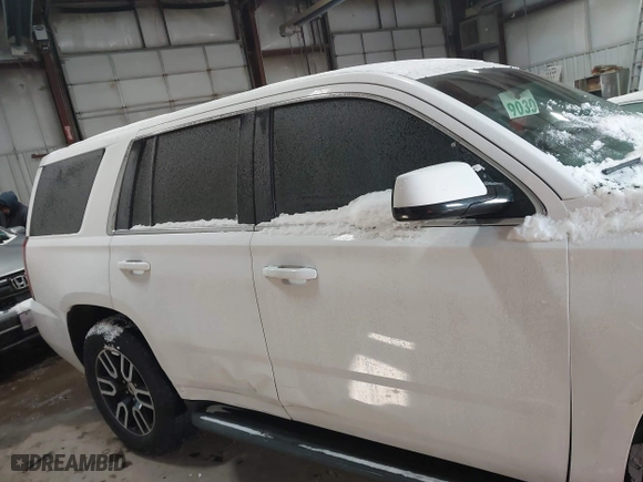 2015 Chevrolet Tahoe Commercial with VIN 1GNSK2EC8FR722684, listed as a IAAI auction lot 41553558 with 119,434 mi miles. Bid and sale history available at carsss.com. Image 13.
