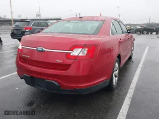 2010 Ford Taurus SEL with VIN 1FAHP2EW2AG103135, listed as a IAAI auction lot 41789927 with 129,353 mi miles. Bid and sale history available at carsss.com. Image 4.