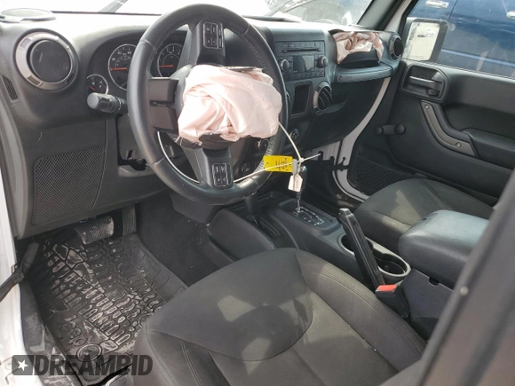 2016 Jeep Wrangler Willys Wheeler z VIN 1C4AJWAG7GL297695, wystawiony jako Copart lot #70838414 z przebiegiem 82 813 mil mil oraz Szkoda całkowita • Salvage title. Historia ofert i sprzedaży dostępna na DreamBid. Obrazek 8.