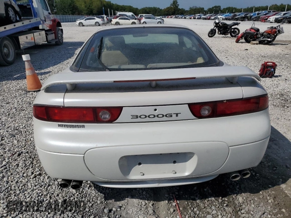 1996 Mitsubishi 3000GT GT z VIN JA3AM84J7TY005775, wystawiony jako Copart lot #70461554 z przebiegiem 102 704 mil mil oraz Tytuł czysty. Historia ofert i sprzedaży dostępna na DreamBid. Obrazek 6.