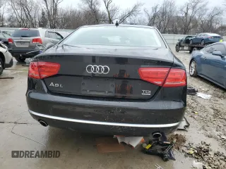 2014 Audi A8 3.0L TDI z VIN WAURMAFD3EN001307, wystawiony jako Copart lot #43476125 z przebiegiem 85 921 mil mil oraz Tytuł czysty. Historia ofert i sprzedaży dostępna na DreamBid. Obrazek 6.