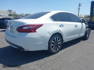 2018 Nissan Altima 2.5 SV with VIN 1N4AL3AP4JC186544, listed as a IAAI auction lot 41892390 with 113,384 mi miles. Bid and sale history available at carsss.com. Image 4.
