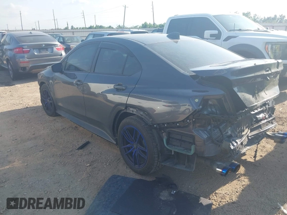 2022 Subaru WRX Premium with VIN JF1VBAF61N9032210, listed as a IAAI auction lot 42037353 with 33,886 mi miles and . Bid and sale history available at DreamBid. Image 3.