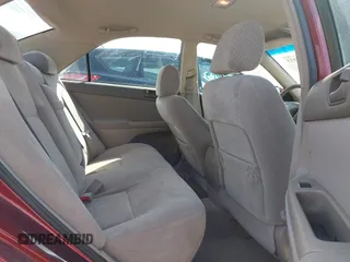 2004 Toyota Camry LE with VIN 4T1BE32K34U377605, listed as a IAAI auction lot 42107813 with 110,724 mi miles. Bid and sale history available at carsss.com. Image 8.