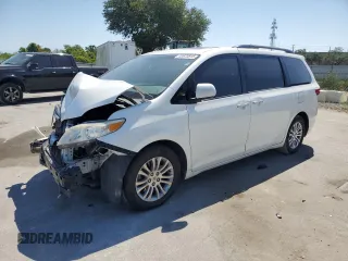 2015 Toyota Sienna XLE with VIN 5TDYK3DC1FS612491, listed as a Copart auction lot 53673815 with 169,306 mi miles and Salvage Title. Bid and sale history available at DreamBid. Image 1.