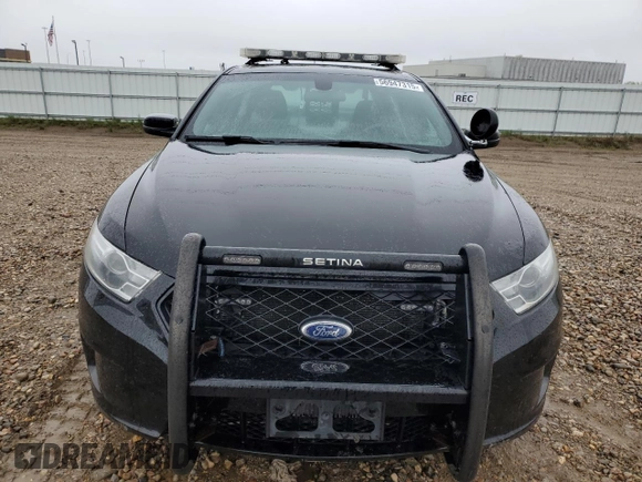 2014 Ford Police Interceptor with VIN 1FAHP2MT9EG111729, listed as a Copart auction lot 56947315 with 74,887 mi miles and Salvage title. Bid and sale history available at DreamBid. Image 5.
