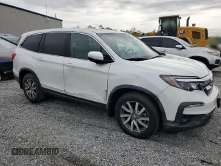 2020 Honda Pilot EX-L z VIN 5FNYF5H5XLB025072, wystawiony jako Copart lot #53275905 z przebiegiem 34 258 mil mil oraz Szkoda całkowita • Salvage title. Historia ofert i sprzedaży dostępna na DreamBid. Obrazek 4.