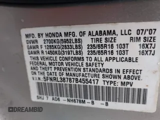 2007 Honda Odyssey EX-L with VIN 5FNRL38787B455417, listed as a IAAI auction lot 42104303 with 214,482 mi miles and . Bid and sale history available at DreamBid. Image 9.