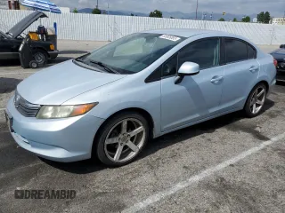 2012 Honda Civic LX z VIN 2HGFB2F52CH520205, wystawiony jako Copart lot #56905065 z przebiegiem 130 925 mil mil oraz Szkoda całkowita • Salvage title. Historia ofert i sprzedaży dostępna na DreamBid. Obrazek 1.