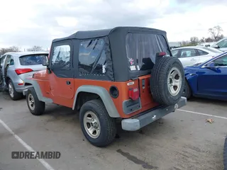 2000 Jeep Wrangler SE with VIN 1J4FA29P2YP804574, listed as a IAAI auction lot 41723297 with 172,991 mi miles. Bid and sale history available at carsss.com. Image 3.