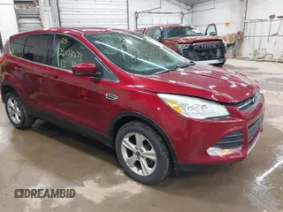 2013 Ford Escape SE with VIN 1FMCU9GX1DUC56361, listed as a IAAI auction lot 42042233 with 136,441 mi miles and . Bid and sale history available at DreamBid. Image 1.