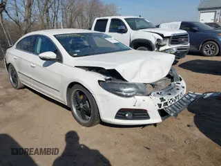2010 Volkswagen CC Sport with VIN WVWML7AN1AE512074, listed as a IAAI auction lot 41790295 with 135,626 mi miles. Bid and sale history available at carsss.com. Image 1.