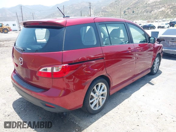 2015 Mazda 5 Grand Touring with VIN JM1CW2DL6F0190312, listed as a IAAI auction lot 42433782 with 79,140 mi miles and . Bid and sale history available at DreamBid. Image 4.