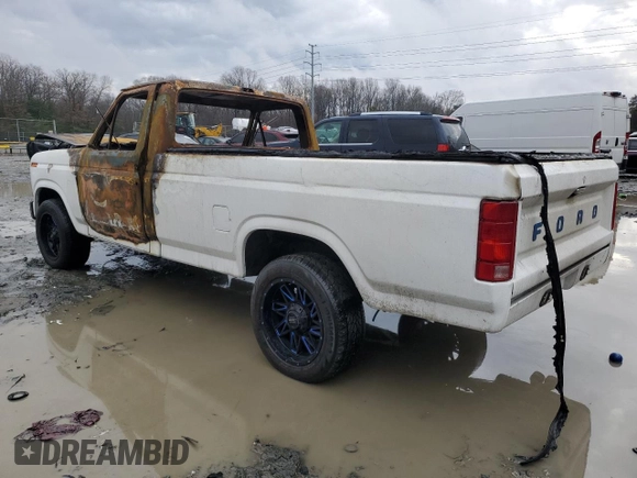 1985 Ford F-150 with VIN 1FTDF15Y4FNA66826, listed as a Copart auction lot 43598765 with 0 mi miles and Salvage Title. Bid and sale history available at carsss.com. Image 2.