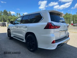 2017 Lexus LX 570 z VIN JTJHY7AX7H4243757, wystawiony jako Copart lot #66006545 z przebiegiem 94 422 mil mil oraz Czysty tytuł • Clean title. Historia ofert i sprzedaży dostępna na DreamBid. Obrazek 3.