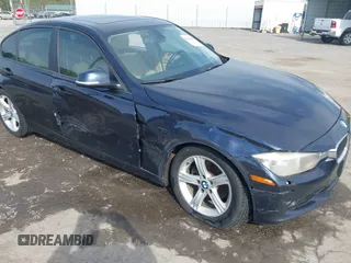 2013 BMW 3 Series 328i xDrive with VIN WBA3B5G53DNS02293, listed as a IAAI auction lot 42012883 with 243,490 mi miles. Bid and sale history available at carsss.com. Image 6.